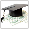 Graduation cap on top of money