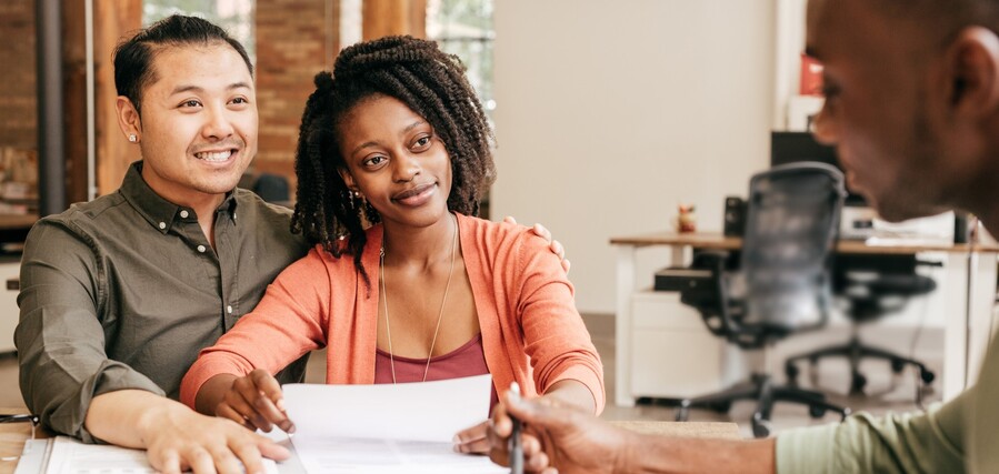 Couple signing loan